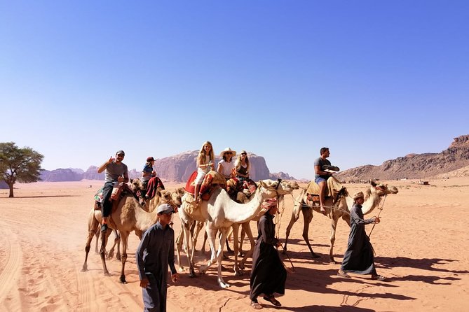 2 Days Wadi Rum and Petra Tour from Wadi Arava Border - Day 1 in Wadi Rum: jeep time, rock inscriptions, and a campsite drop-off