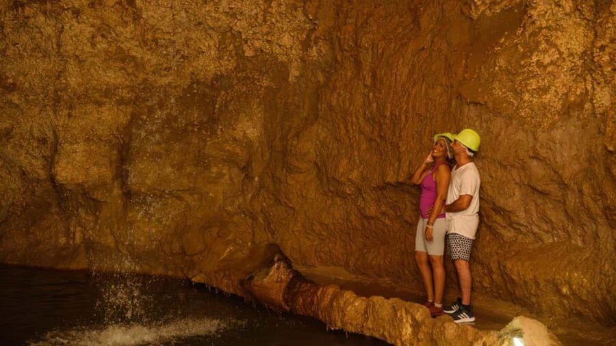 Barbados: Trail, Tram & Rum Experience - Tram tour inside Harrison’s Cave: helmet on, wow factor on