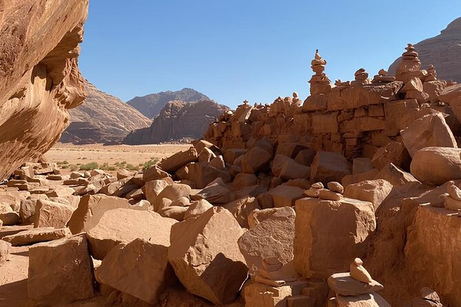 Discover Wadi Rum by 4x4 with a Bedouin guide - Um Ishrin canyon inscriptions: learning with your eyes open