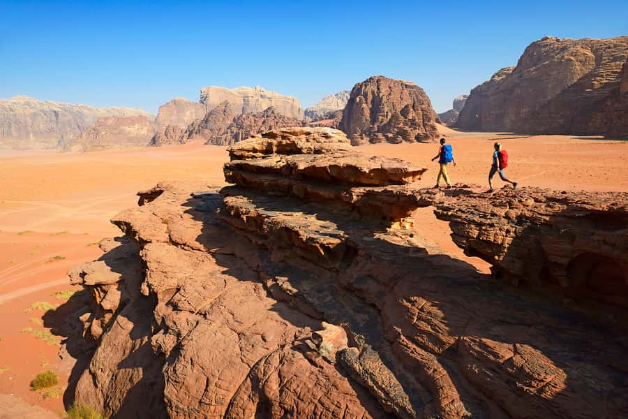 From Aqaba: Jeep Tour to Wadi Rum Desert - Canyons, Water Holes, and Ancient Rock Drawings