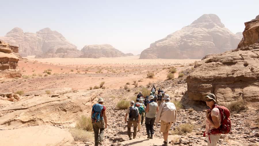 From Wadi Rum: 2-Day Hiking Adventure and Jeep Tour - Bedouin Camp Night: Tea Welcome, Arabic Sweets, and Milky Way Watching