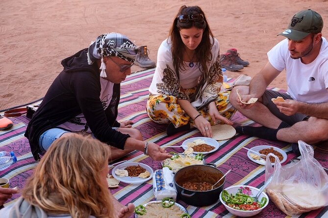 Full Day Jeep Tour in Wadi Rum (incl. Bedouin picnic lunch) - Burdah Rock Bridge From Below and the Um Sabatah Sunset