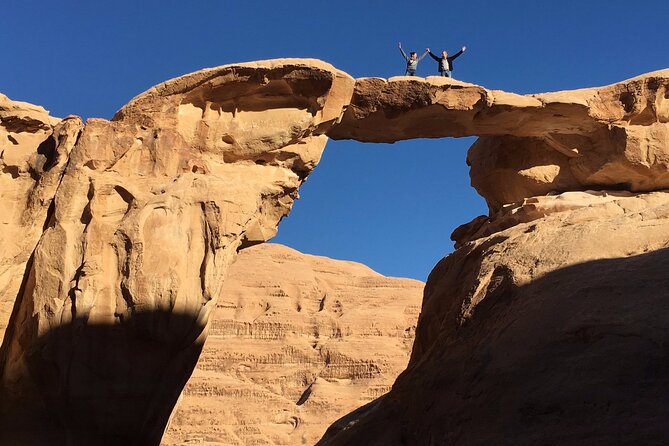 Full-Day Jeep Tour in Wadi Rum with Overnight Stay - Jebel Khazali Siq: inscriptions, petroglyphs, and rock-cut basins