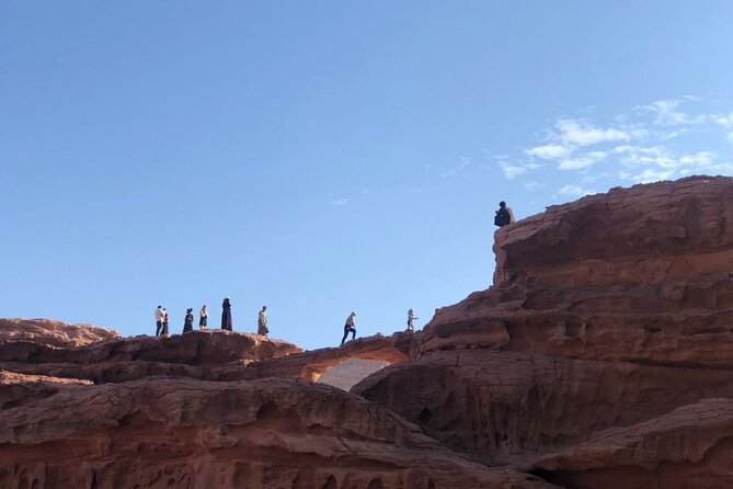 Full Day Jeep Tour & Traditional Lunch - Wadi Rum Desert Highlights - Fire-cooked lunch in the desert and a calm canyon walk