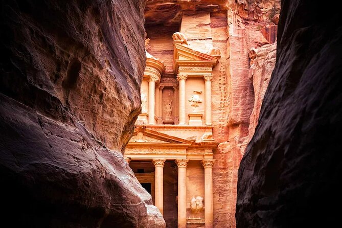 Full Day Petra and Wadi Rum Tour from Amman - Wadi Rum Protected Area: the desert shift from stone to sand