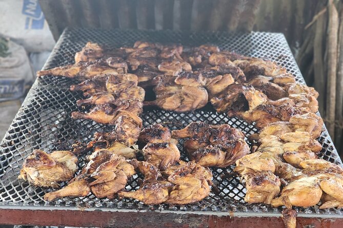 Jamaican Street Food and Rum Tasting Private Tour - The food lineup: jerk chicken, patties, and fruit you can taste the difference in