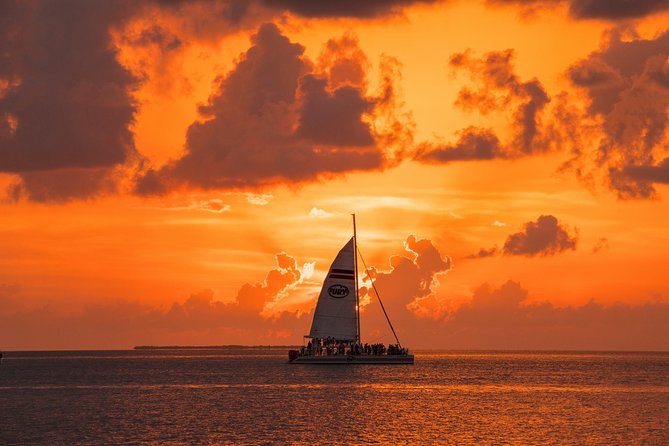 Key West Rum and Reggae: Reef Snorkel Adventure and Sunset Sail - Sunset sails and reggae on the catamaran: the deck experience