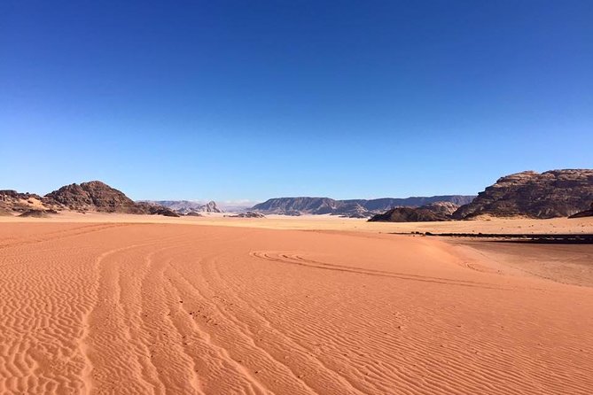 Petra and Wadi Rum 2 Days Tour from Aqaba - Day 1 in Wadi Rum: Sunset Jeep Safari and a Real Bedouin Camp Evening