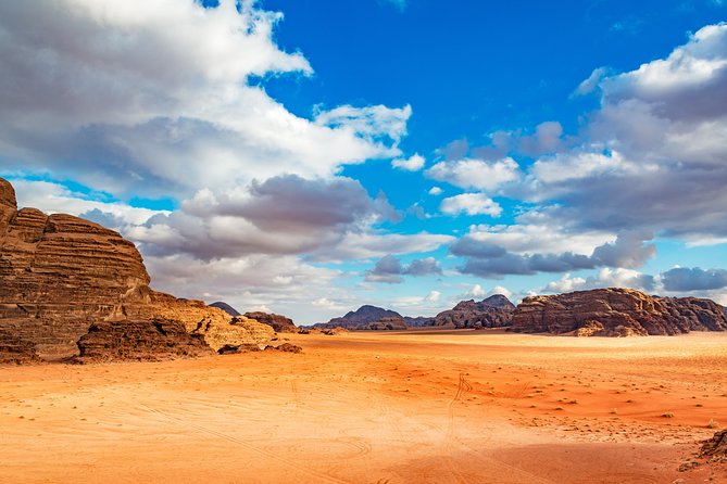 Private Full-Day Wadi Rum and Petra Tour from Aqaba - Wadi Rum 4x4 in the Valley of Moon: pink rocks, Lawrence touches, and tea