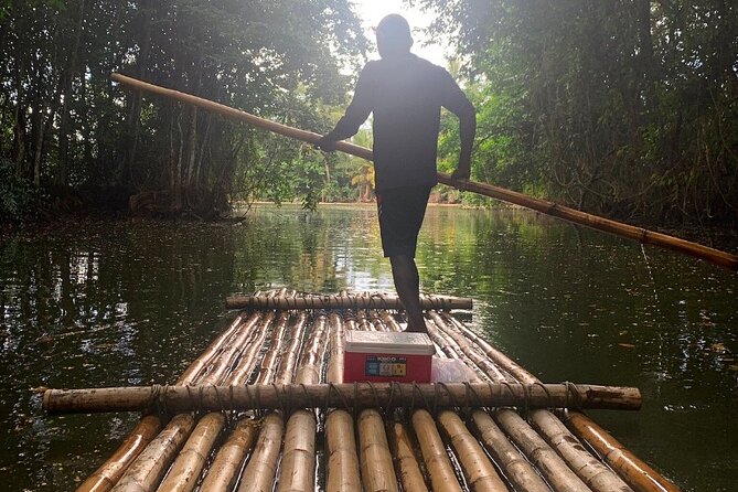 St Lucia Bamboo Rafting Experience (+Rum Tasting) - Roseau Beach stop: where you step onto the raft and feel the water