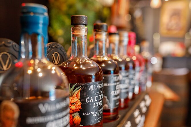 Villainous History and Rum Tasting Tour in York Indoor Experience - Atmosphere inside: villain lair lighting and small-group comfort