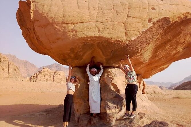 Wadi Rum 2-Day Jeep Tour with Meals and Overnight in Bedouin Camp - Sunset tea, underground dinner, and stargazing that actually matters