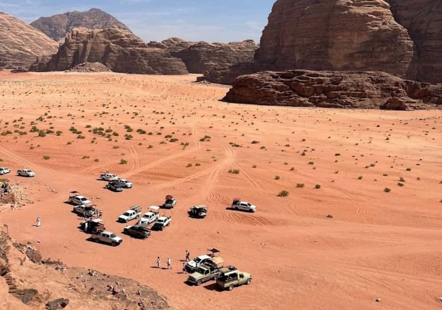 Wadi Rum:Full Day Tour Lunch Sand boarding Camel Ride Sunset - Khazali Canyon Break and Canyon Time: Short Walks That Pay Off